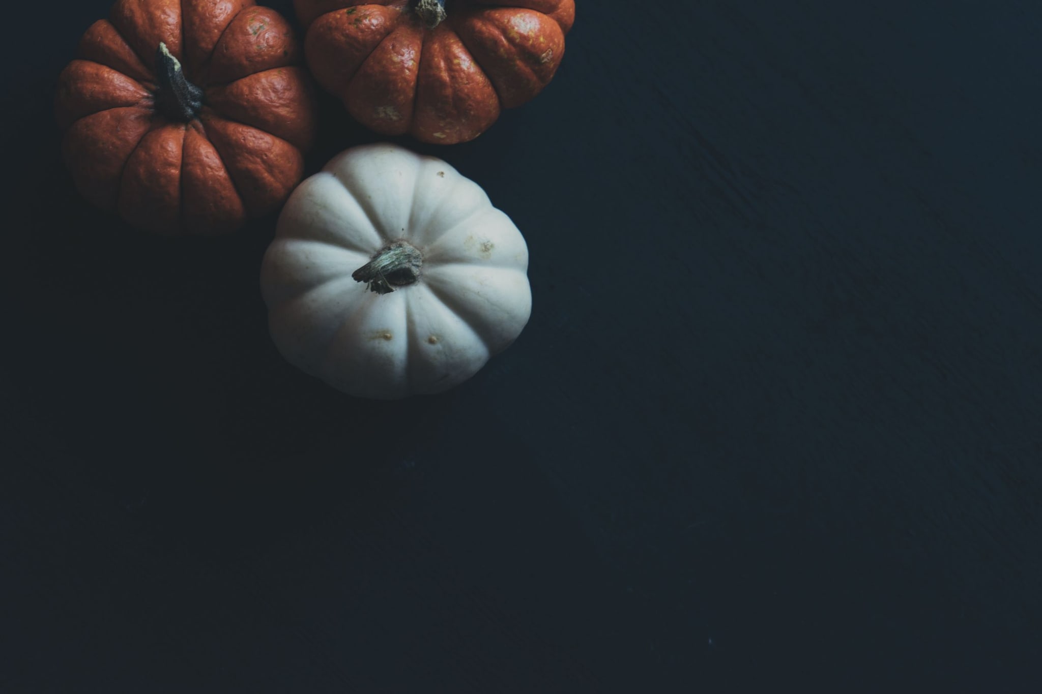 Three mini Halloween pumpkins