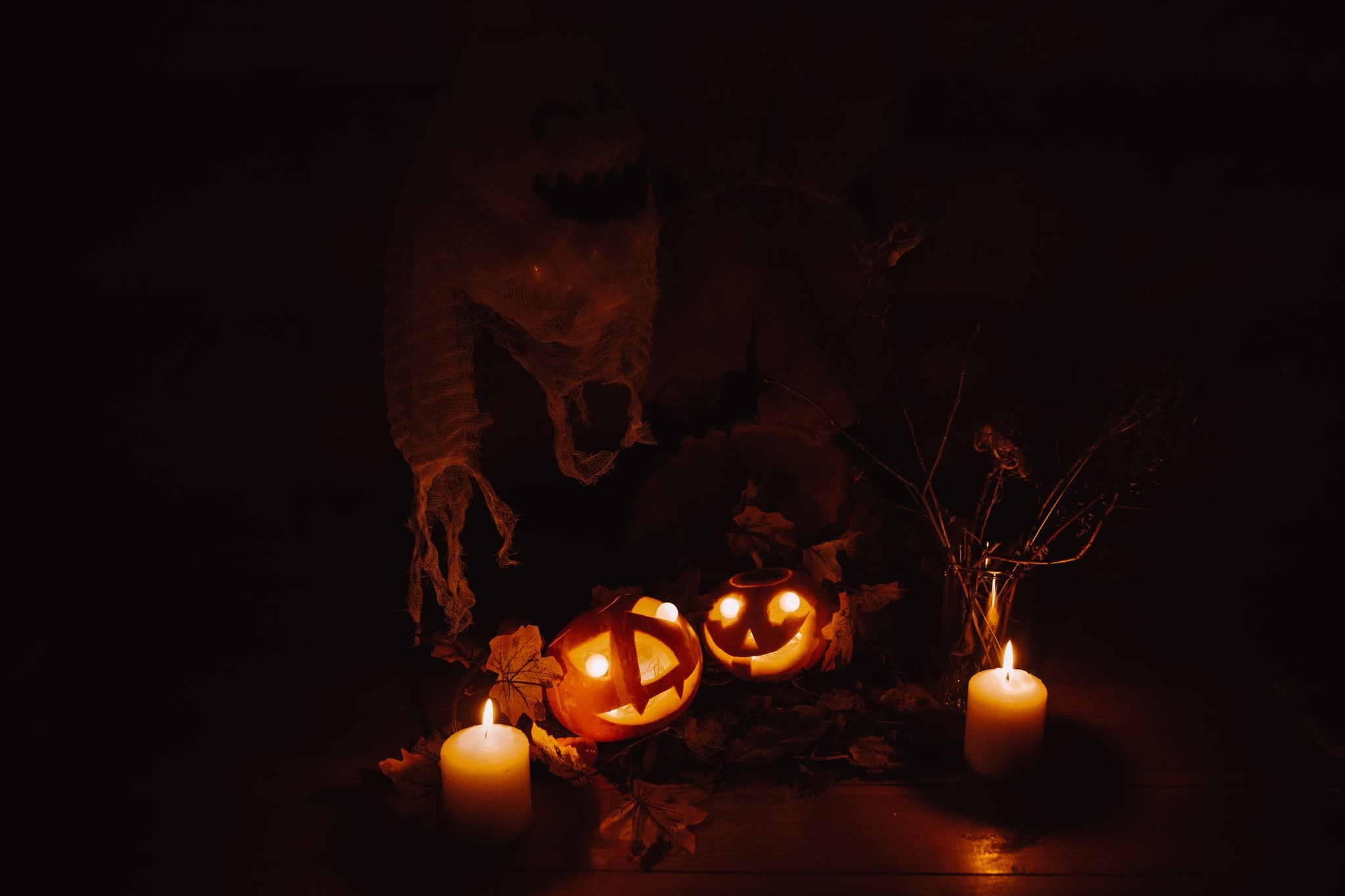 Glowing pumpkins and candles