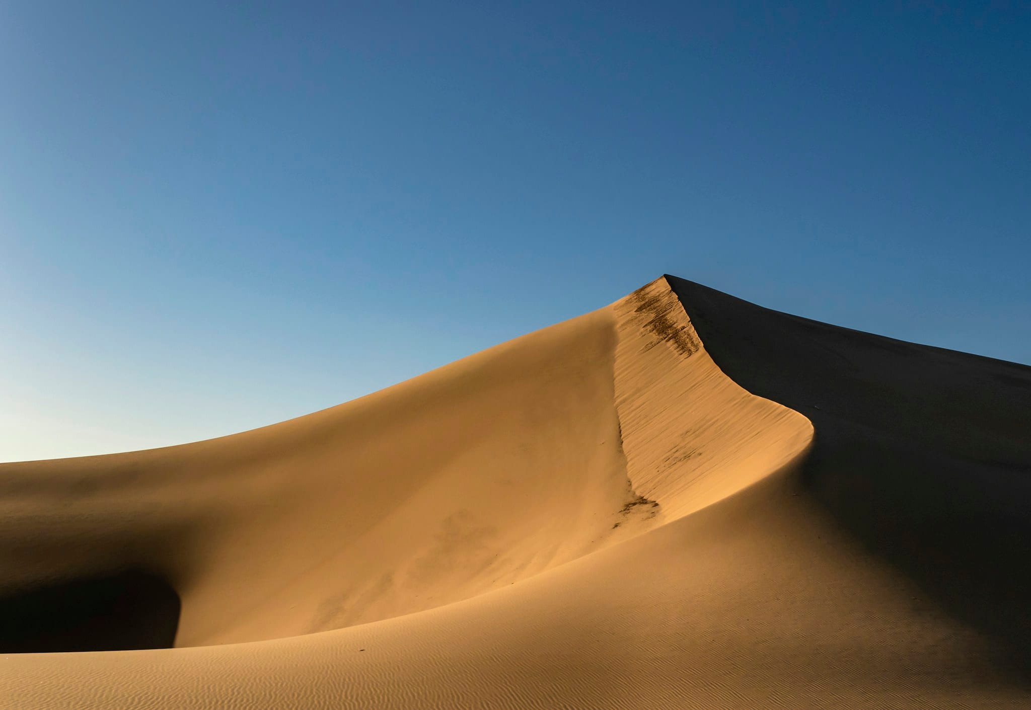 sand mountain during daytime