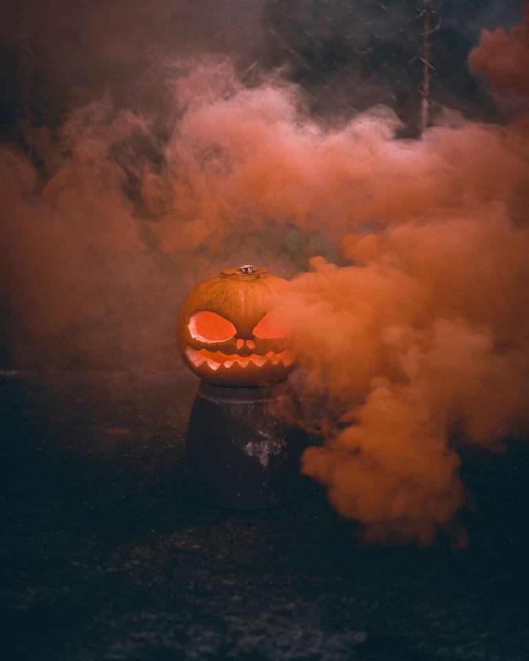 Jack-o'-lantern in orange smoke
