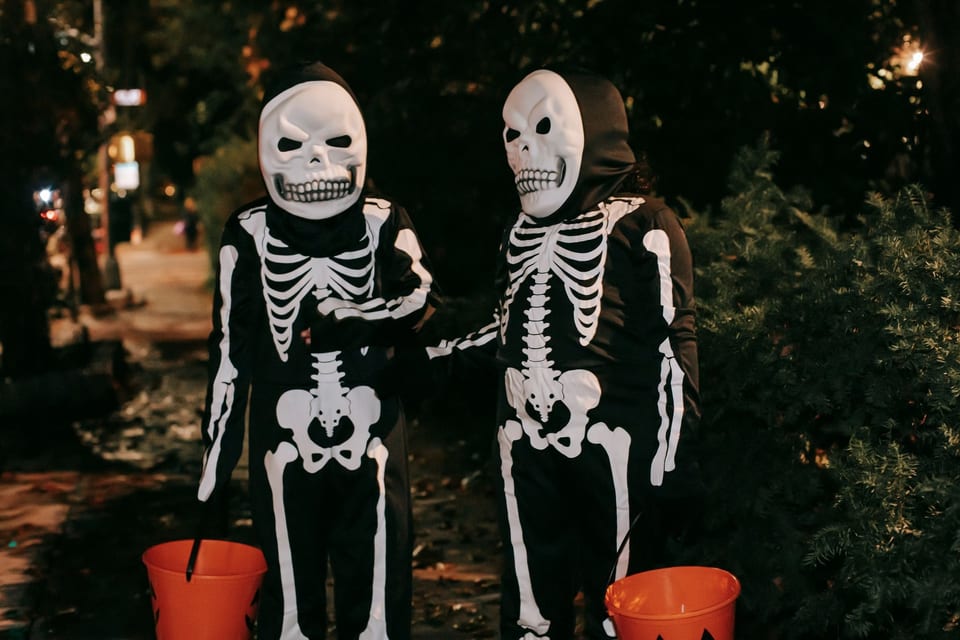 Skeleton costumes talking at night
