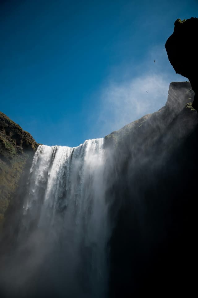 low angle view of waterfall at daytime
